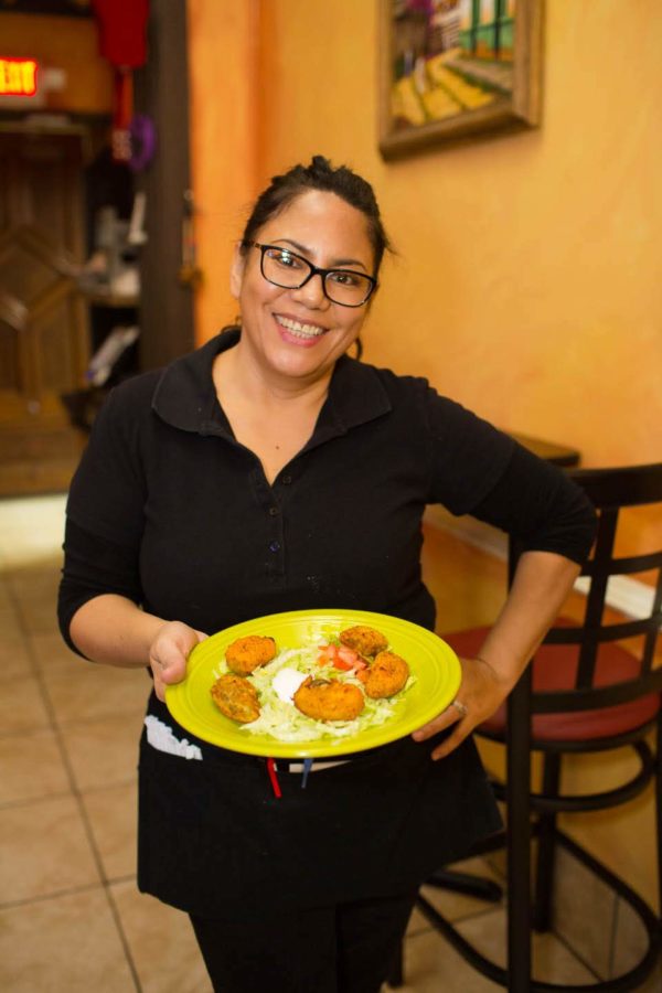 Maria's Mexican Restaurant Waitress Carrying Food